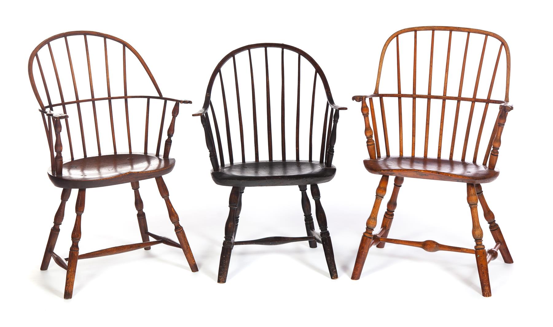 Appraisal: THREE AMERICAN WINDSOR ARMCHAIRS Nineteenth century Two sackbacks with knuckle