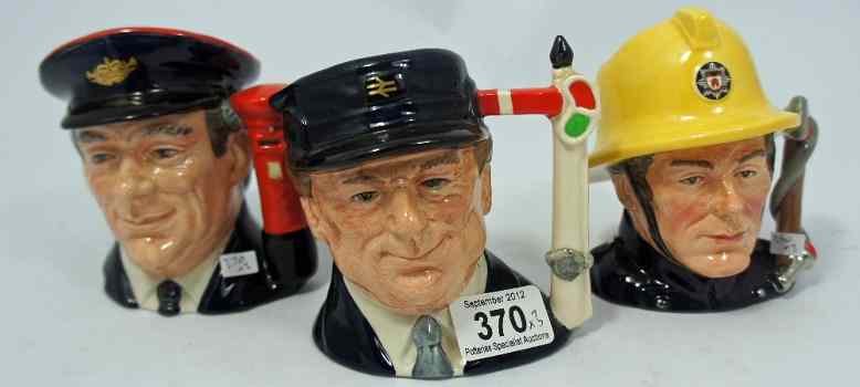 Appraisal: Royal Doulton small character jugs Fireman D Postman D and