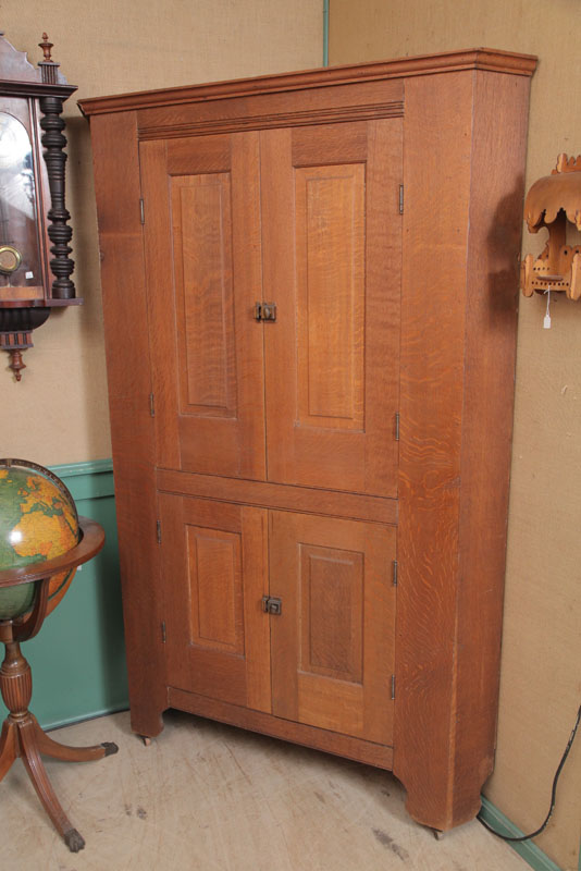 Appraisal: ONE PIECE CORNER CUPBOARD Oak with pine secondary Wide cupboard