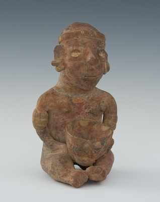 Appraisal: A Terracotta Seated Figure Red color clay figure depicting a