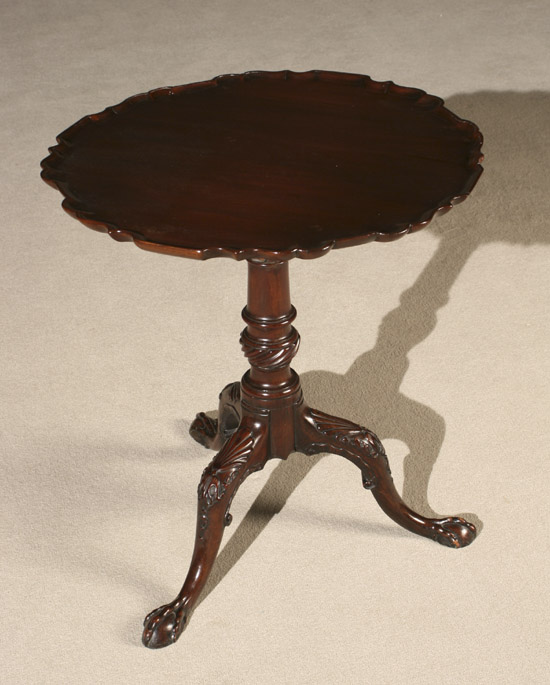 Appraisal: George III Mahogany Tilt-Top Tripod Tea Table Circa Top by