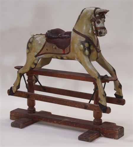 Appraisal: A painted rocking horse circa of small proportions with saddle