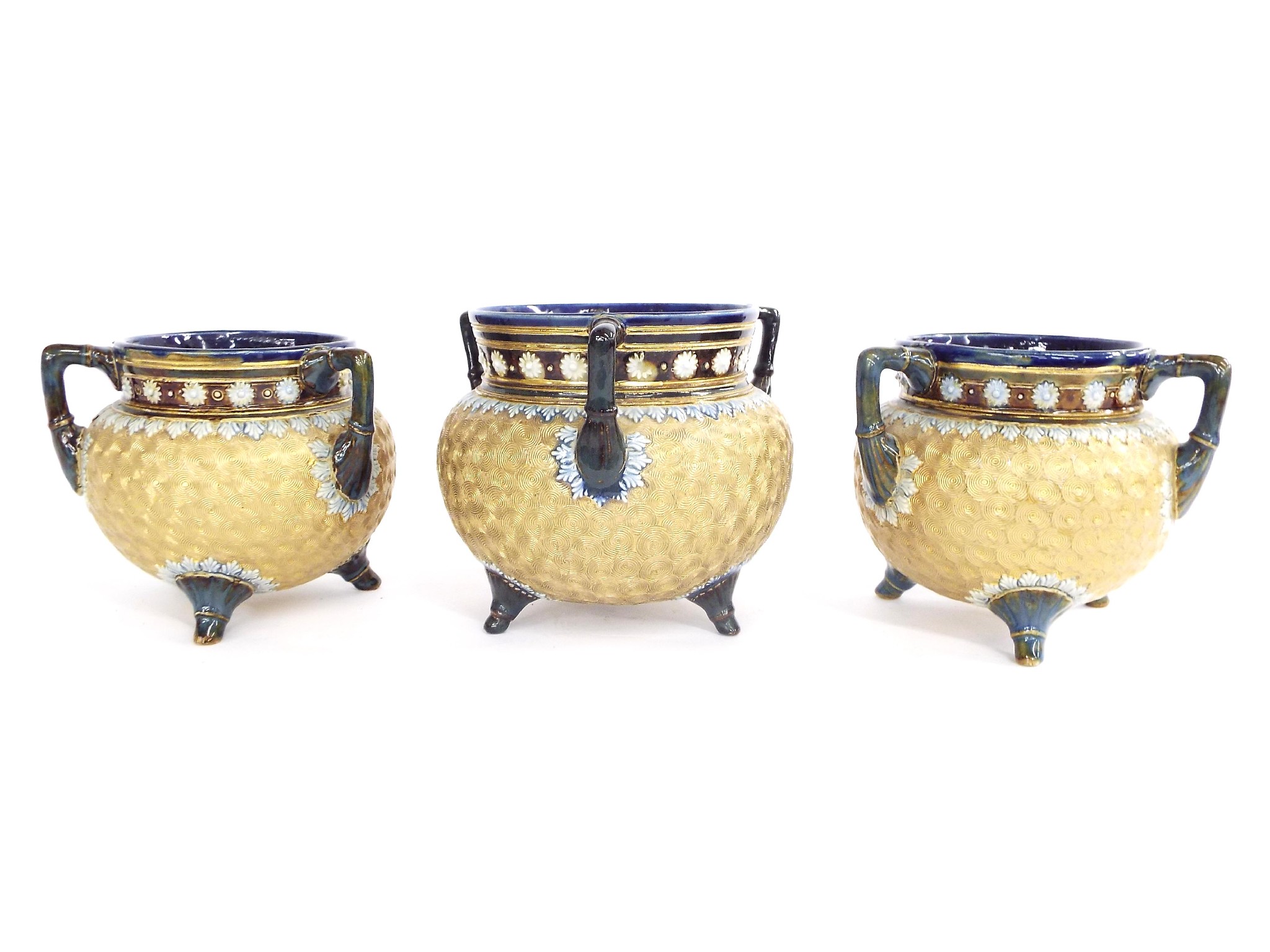 Appraisal: Set of three Doulton Lambeth stoneware cauldron vases with three