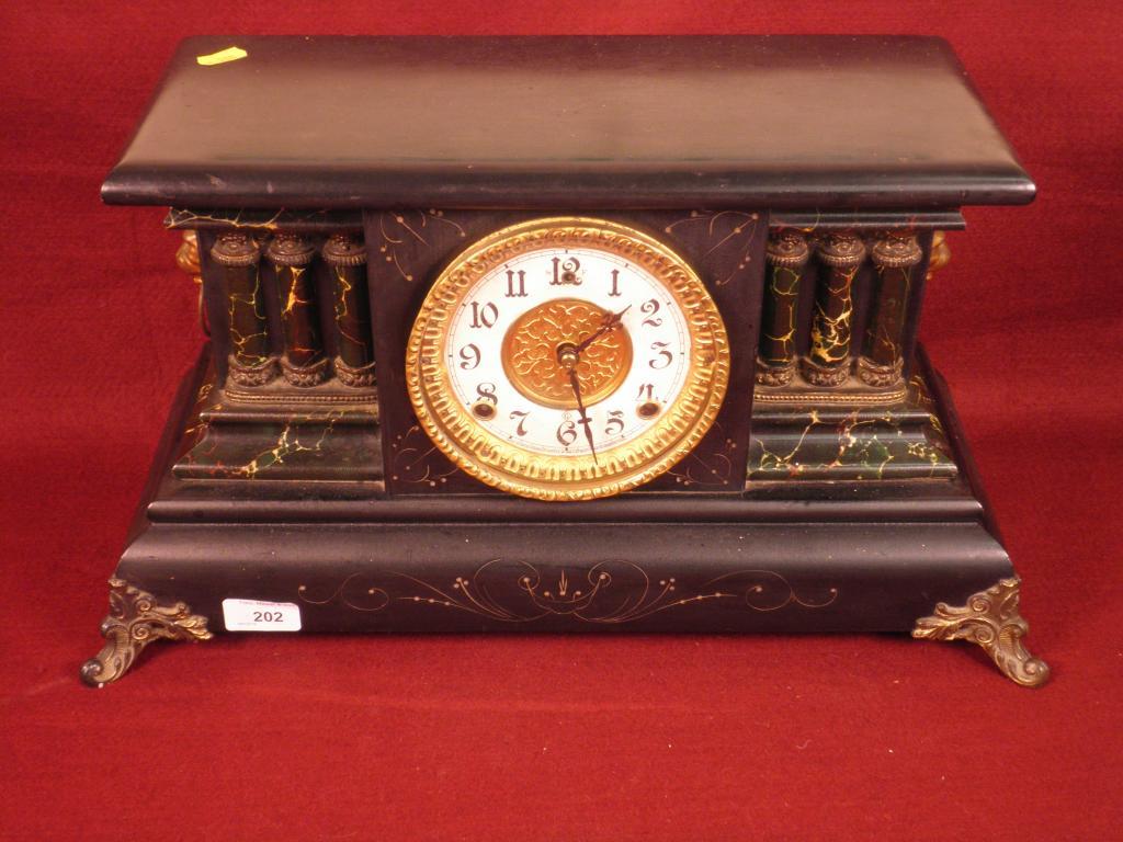 Appraisal: A thC ebonised mantel clock with circular dial by William