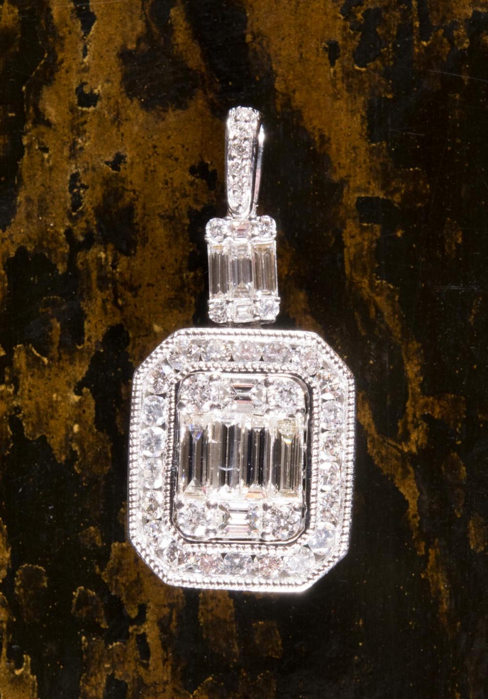 Appraisal: DIAMOND AND EIGHTEEN KARAT WHITE GOLD PENDANT The k white