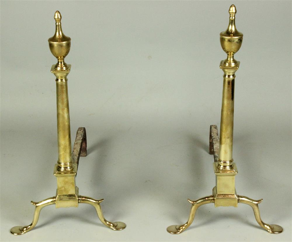 Appraisal: PAIR OF BRASS AND IRON FIREPLACE ANDIRONS ca each having