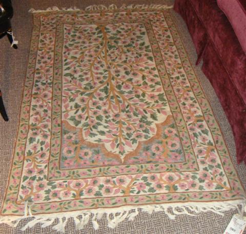 Appraisal: CREWEL EMBROIDERED FLORAL PINK AND GREEN RUG x Feet Provenance