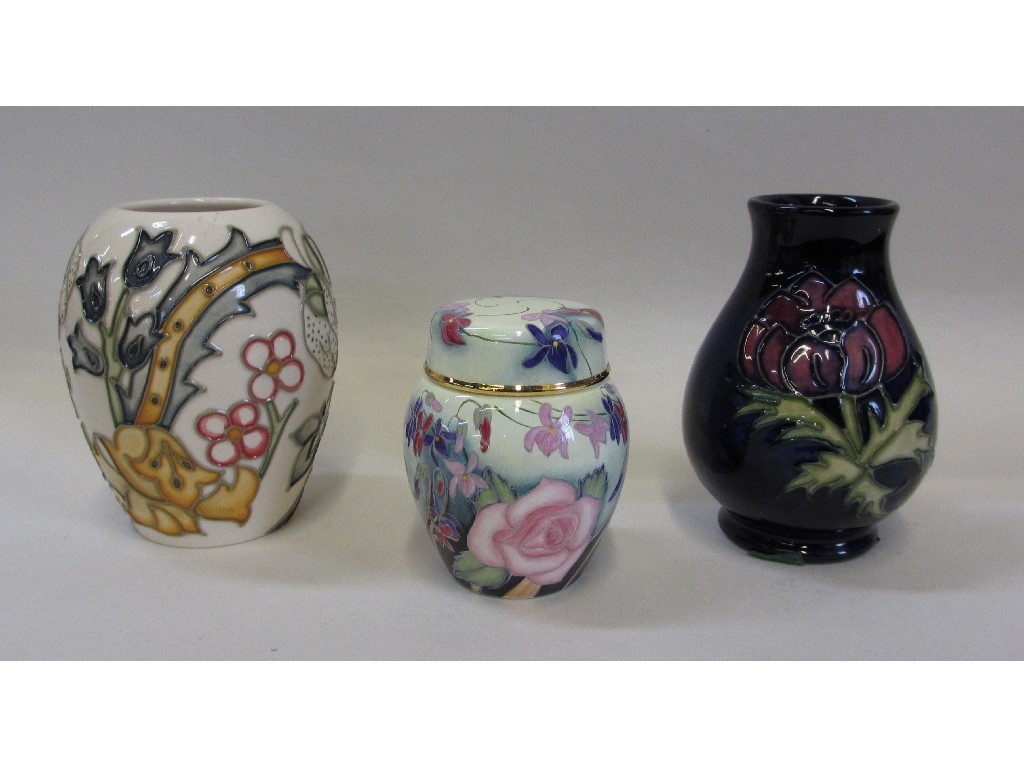 Appraisal: Small Moorcroft Anemone vase another in Tigerlily pattern and a