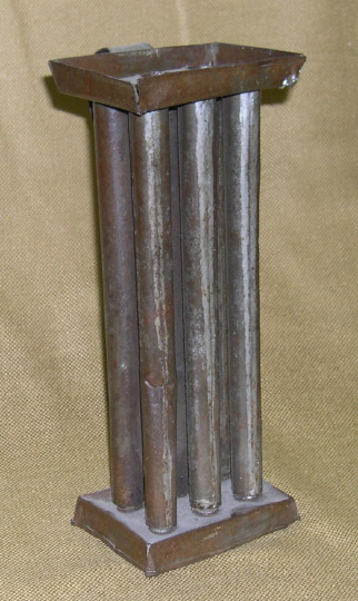 Appraisal: American Tin Six-Candle Mold third quarter th century with loop