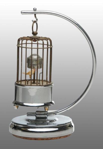 Appraisal: Metal Chrome Bird Cage Clock Description Unusual Condition Excellent Size