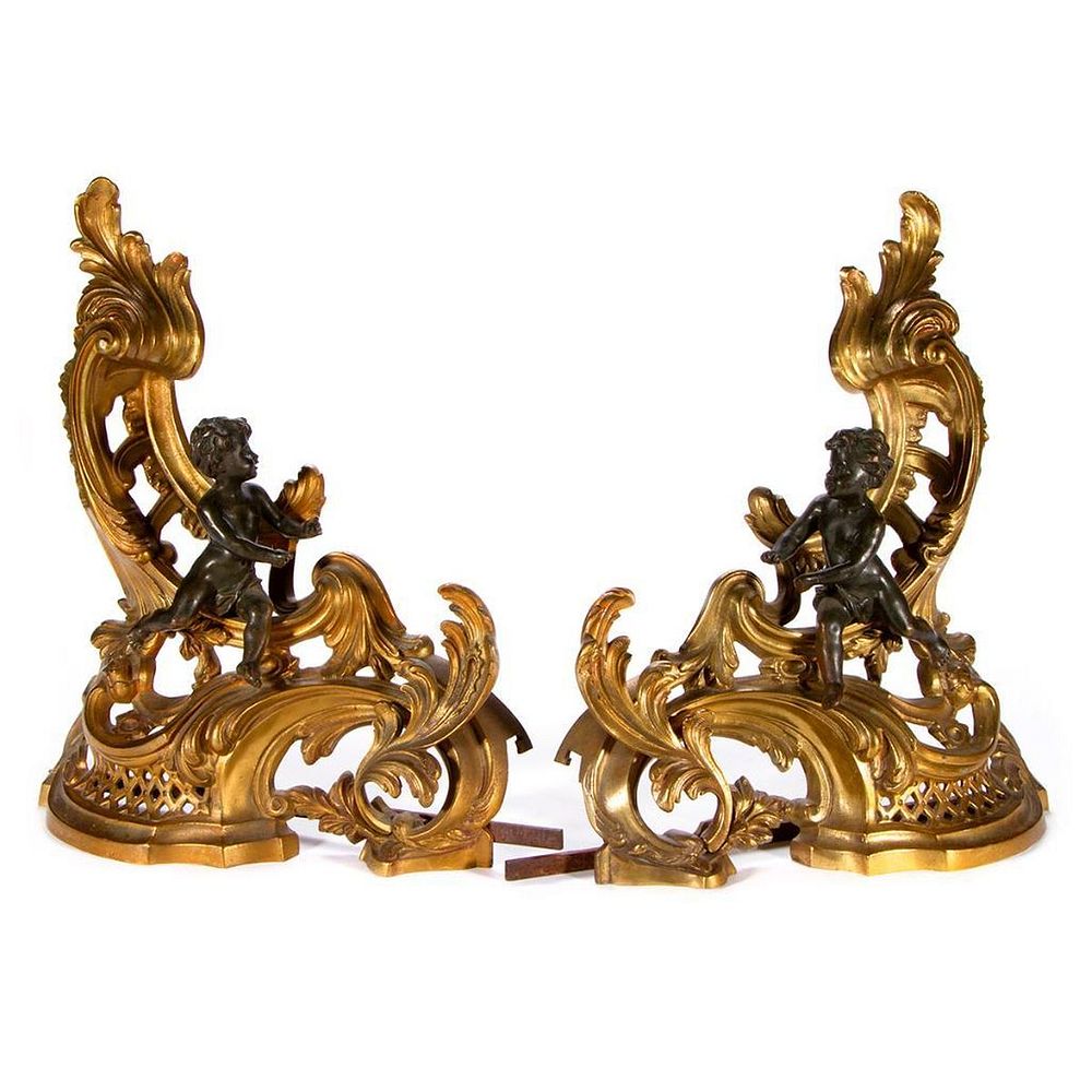 Appraisal: Pair of bronze fireplace mounts A pair of Continental gilt