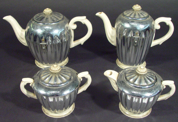 Appraisal: Regent Heatmaster four piece tea service with china bodies and