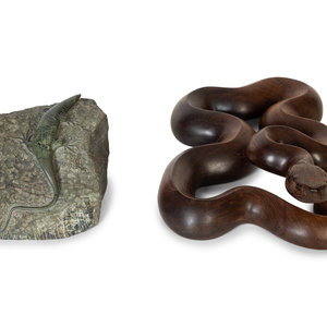 Appraisal: Two Wildlife Sculptures th Century comprising a carved and polished