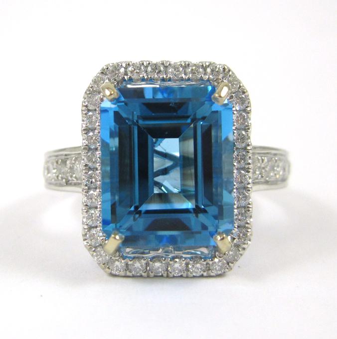 Appraisal: BLUE TOPAZ DIAMOND AND EIGHTEEN KARAT GOLD RING The white