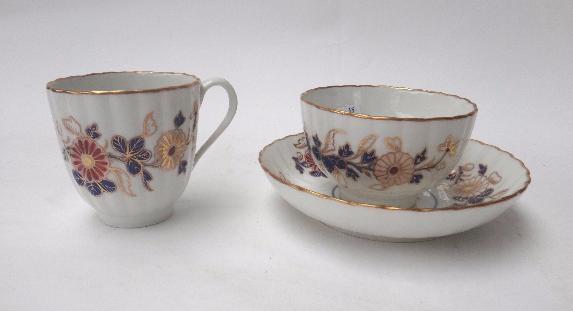 Appraisal: A Derby porcelain fluted trio late th century painted with