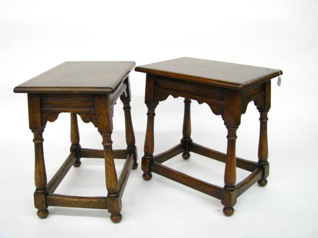 Appraisal: Pair of lodge style oak lamp tables tall x top