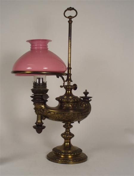 Appraisal: A late th century gilt paraffin lamp with carry handle