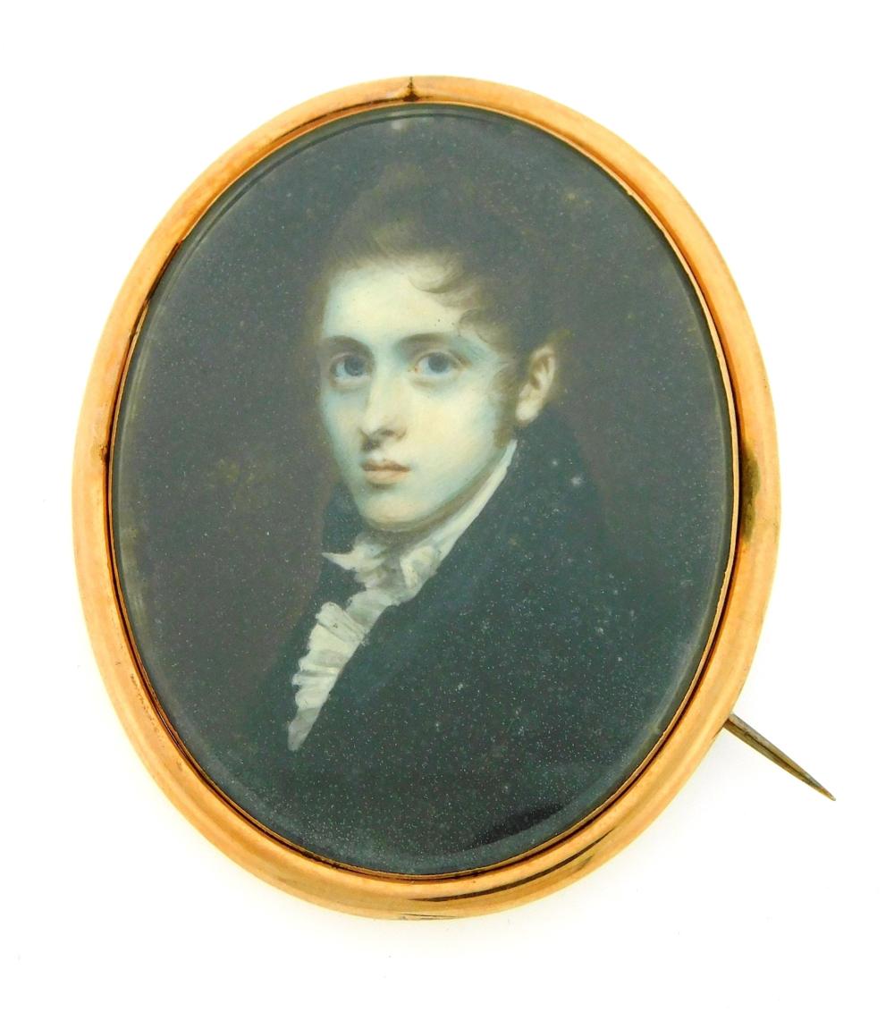 Appraisal: MINIATURE Young man oval support brown hair brushed forward ruffled