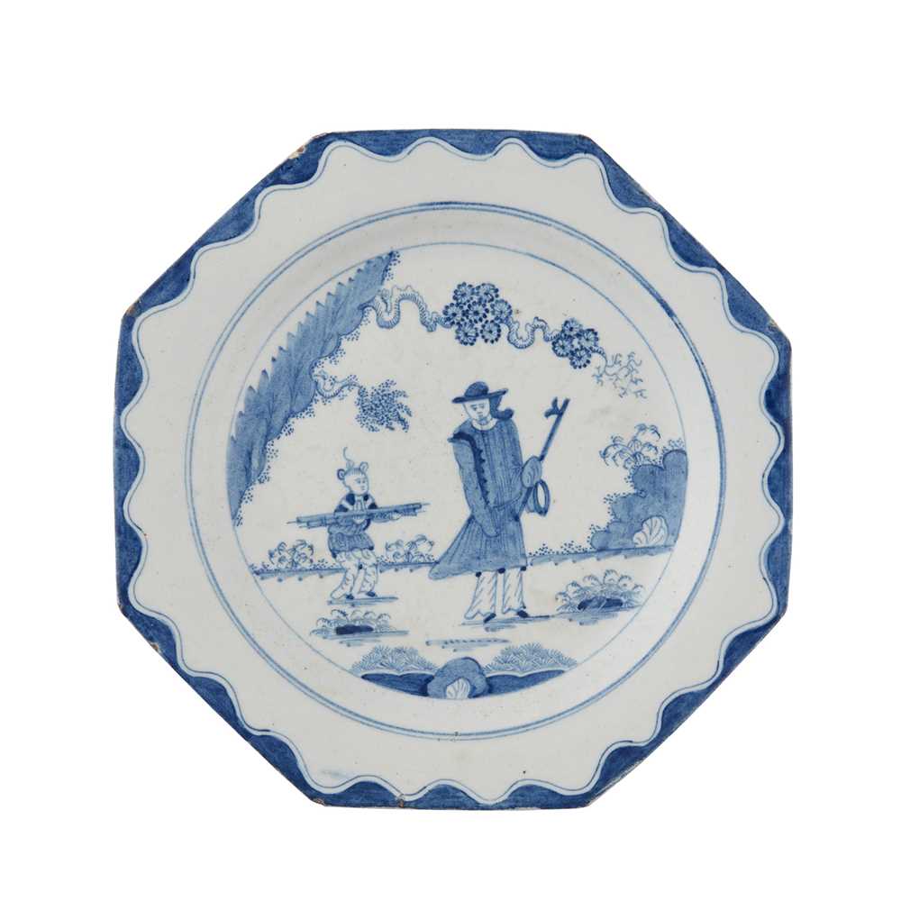 Appraisal: BOW OCTAGONAL GOLFER AND CADDY PATTERN BLUE PAINTED PLATE CIRCA