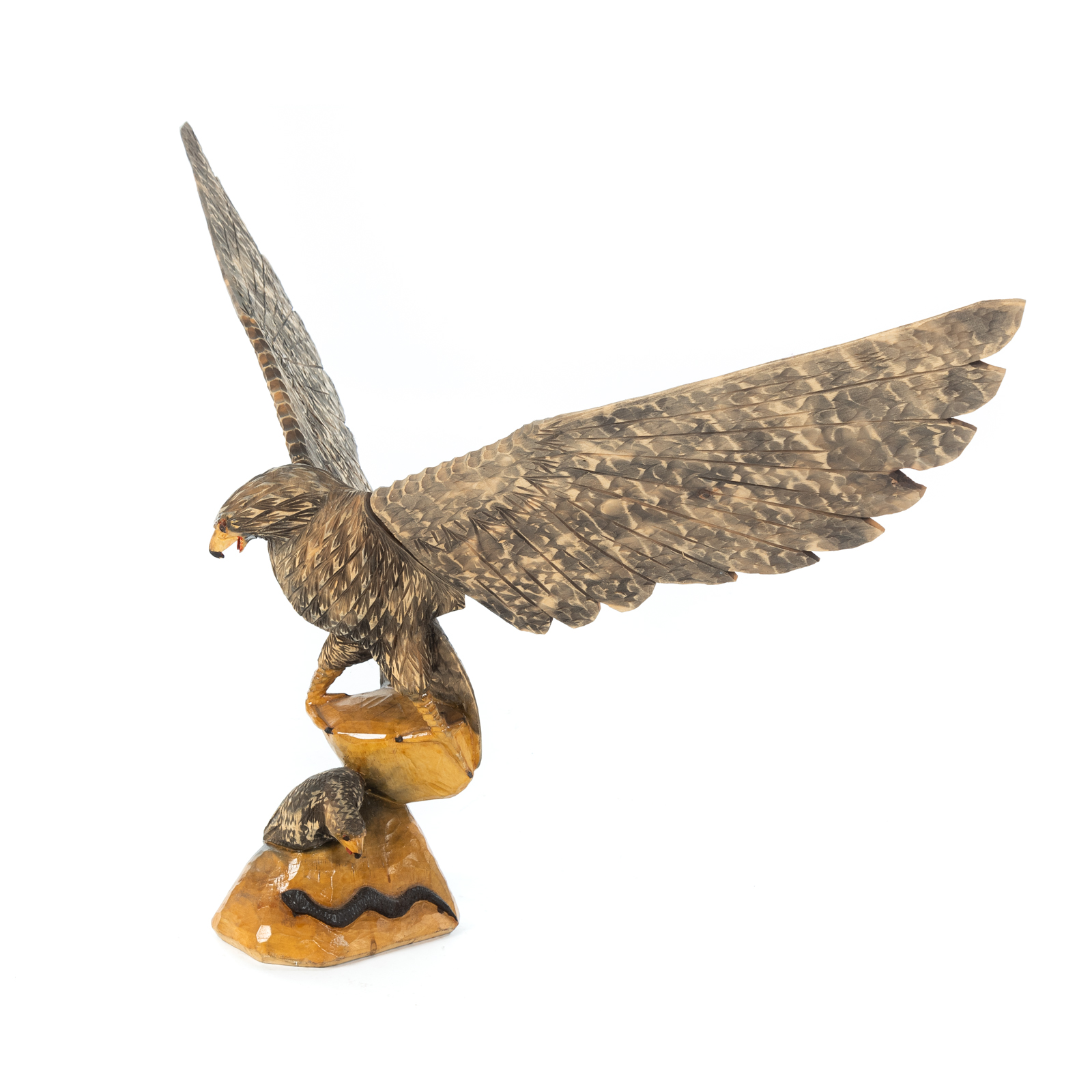 Appraisal: FOLK ART CARVED EAGLE SCULPTURE Depicting an eagle protecting her