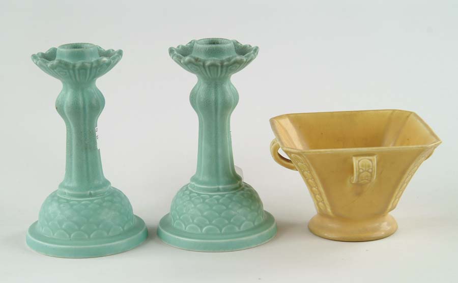 Appraisal: THREE PIECES OF ROOKWOOD POTTERY Pair of Rookwood candleholders in