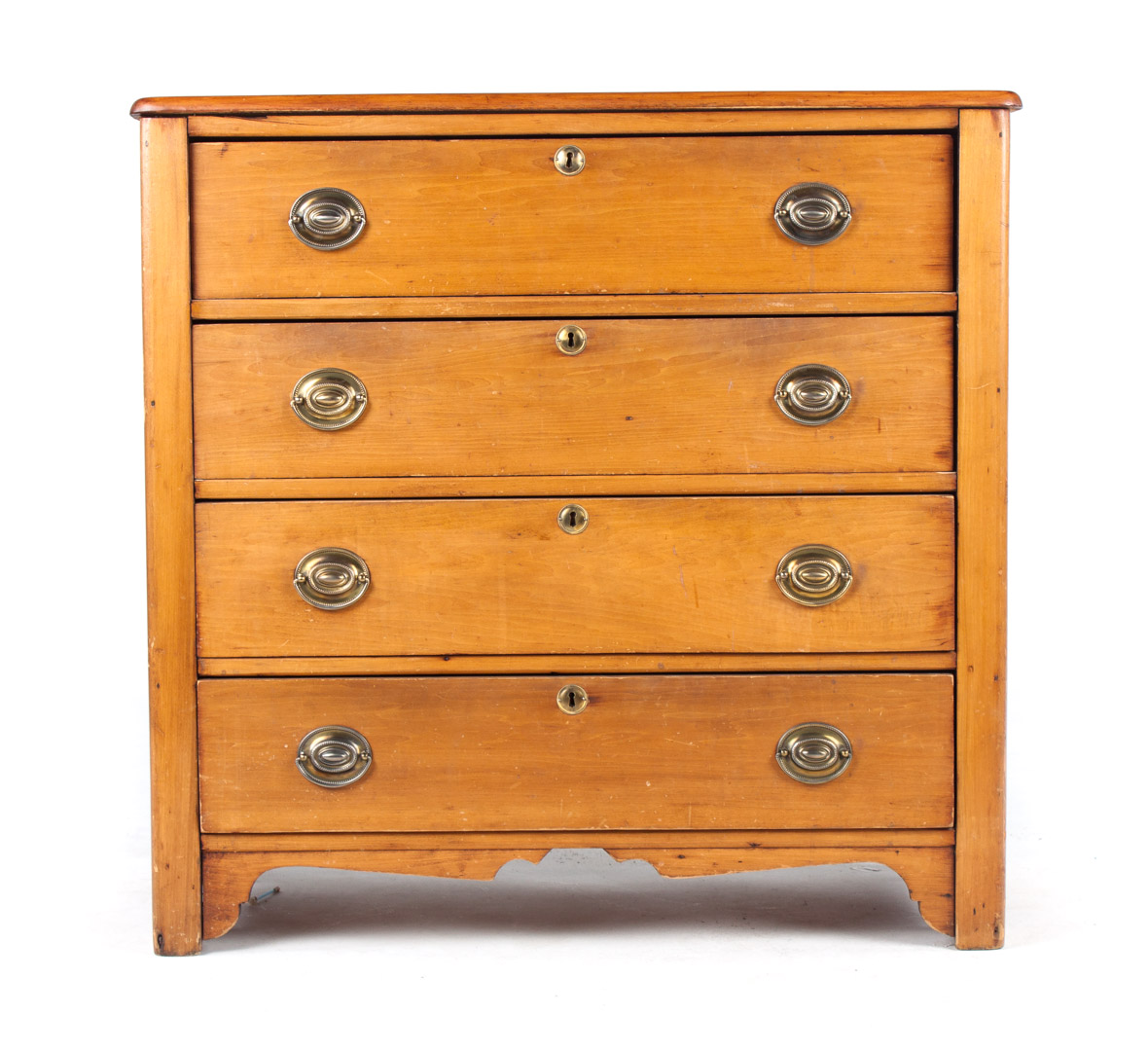 Appraisal: English cottage pine chest th century four drawers shaped apron