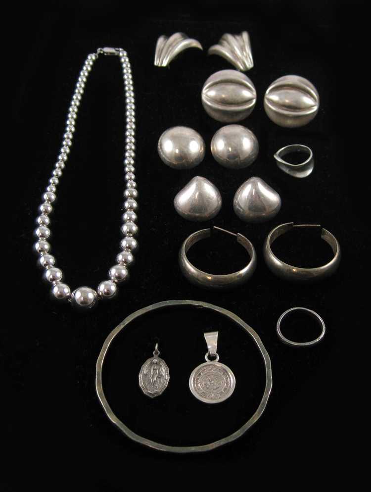 Appraisal: SIXTEEN ARTICLES OF SILVER JEWELRY including a pair of sterling