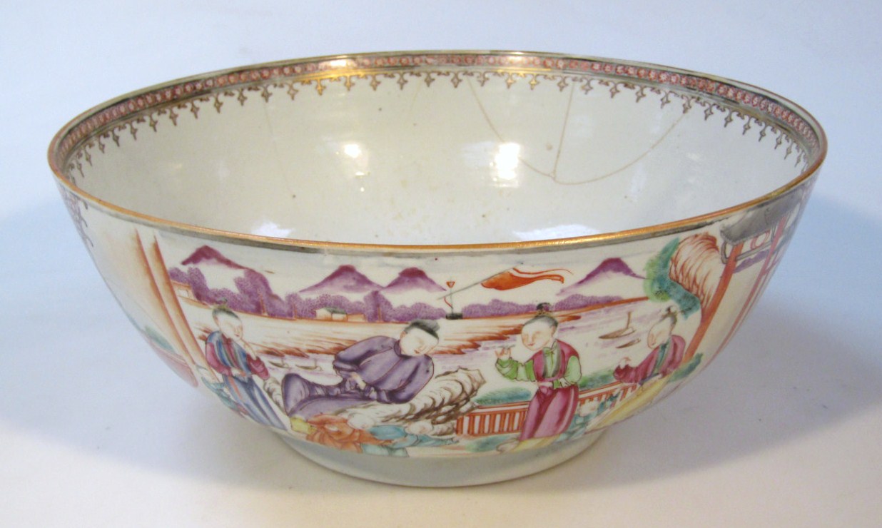 Appraisal: A thC Chinese famille rose punch bowl with outer decoration