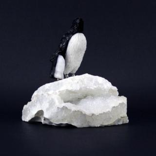 Appraisal: Attributed to Peter Mueller Rock Crystal Specimen and Penguin Grouping