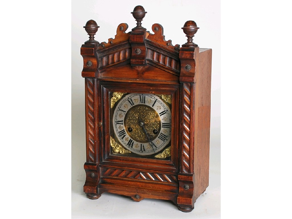 Appraisal: EARLY TWENTIETH CENTURY CONTINENTAL WALNUT MANTEL CLOCK Roman dial with