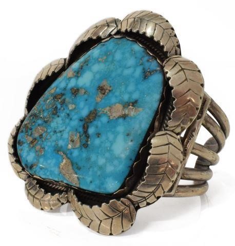 Appraisal: Native American silver content unknown cuff bracelet large bezel-set turquoise