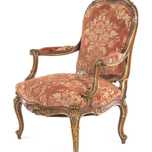 Appraisal: A Louis XV Style Carved and Parcel Gilt Walnut Fauteuil