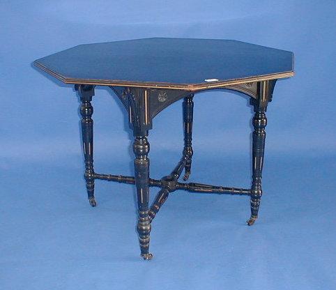 Appraisal: An Edwardian ebonised window table