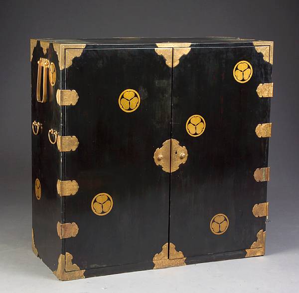 Appraisal: A gilt and black lacquered tansu th Century With a