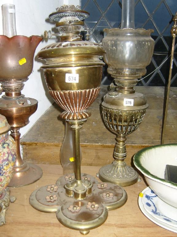 Appraisal: A late th century copper and brass oil lamp base