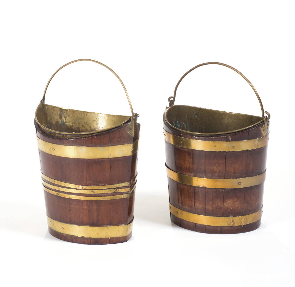 Appraisal: TWO SIMILAR GEORGIAN BRASS-BOUND MAHOGANY PEAT BUCKETS WITH SWING HANDLES