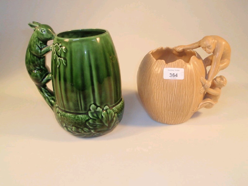 Appraisal: A Sylvac type pottery vase modelled as a coconut and