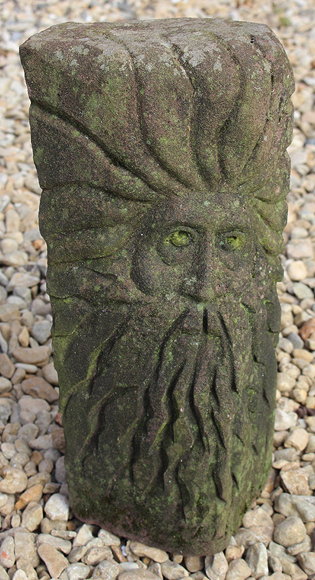 Appraisal: A CARVED STONE FRAGMENT decorated with the face of a