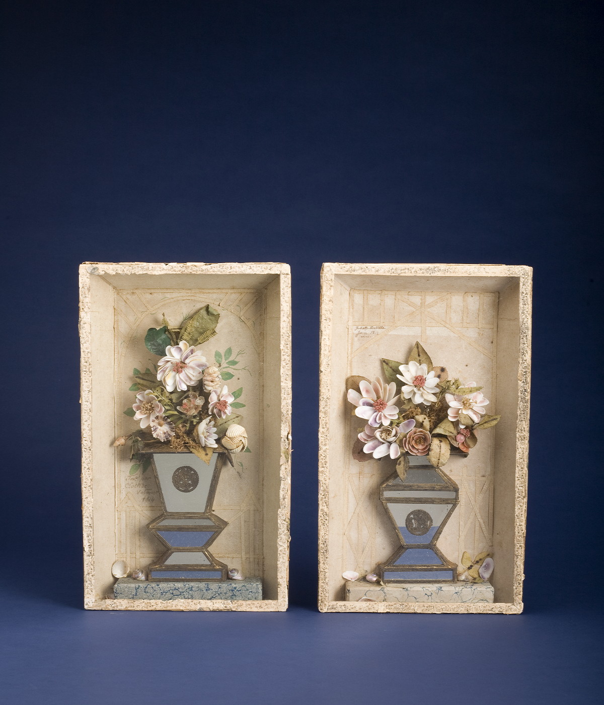 Appraisal: PAIR OF FRENCH PAPER-COVERED SHADOWBOX FRAMES Each containing a mirrored