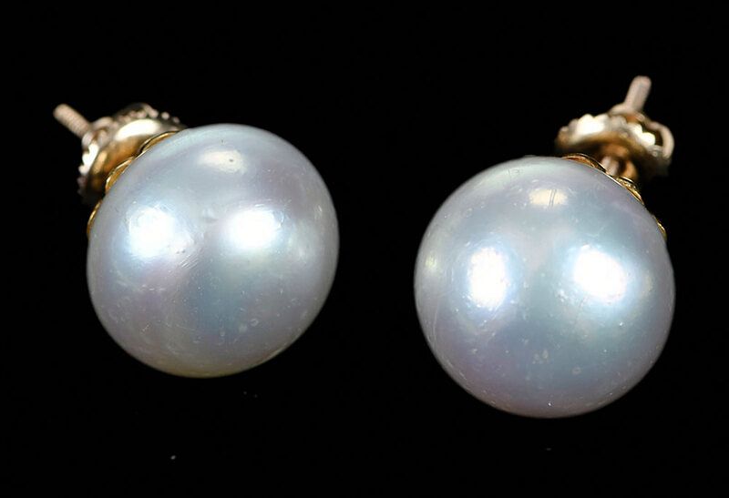 Appraisal: Gold Pearl Earrings oval-ish pearls approx mm each mounting tested