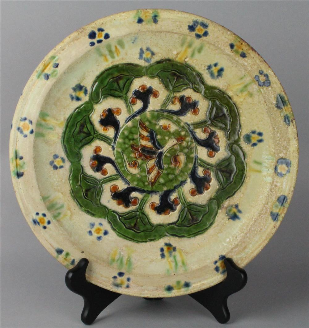 Appraisal: CHINESE SANCAI-GLAZED TRIPOD DISH TANG DYNASTY of circular shape with