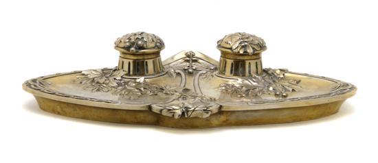 Appraisal: French Silvered Bronze Encrier Gu nardeau the shaped form with