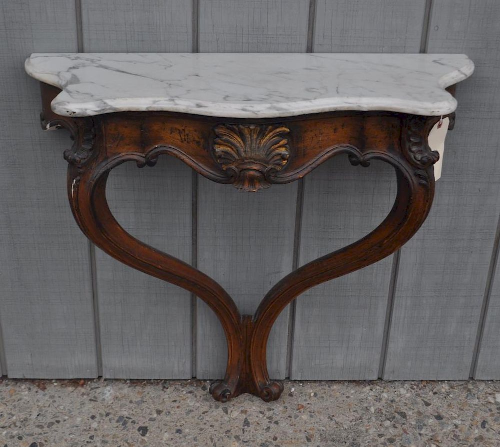 Appraisal: Continental M T Wall Mounted Carved Pier Table with shaped