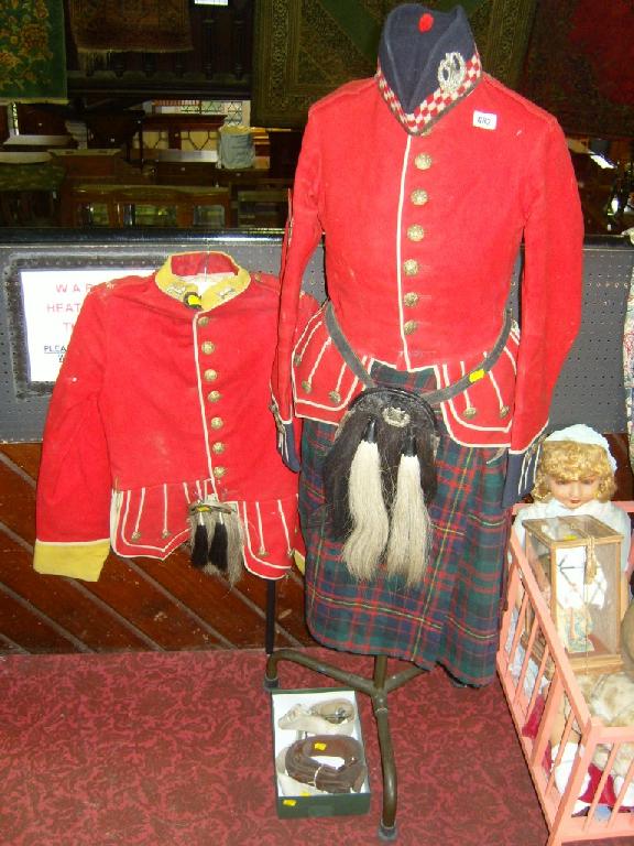 Appraisal: A Gordon Highlanders crimson jacket a further Highlanders regimental jacket