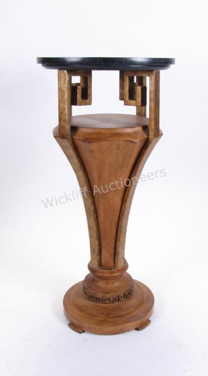 Appraisal: A neo-classical style decorator quality pedestal with black marble top