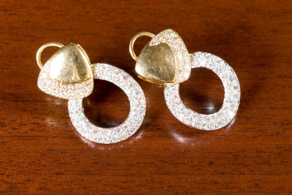 Appraisal: PAIR OF DIAMOND AND EIGHTEEN KARAT GOLD EARRINGS each k