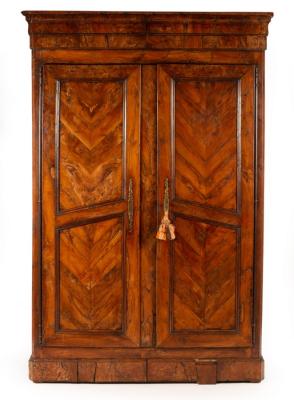 Appraisal: A French yew wood armoire of late th Century style