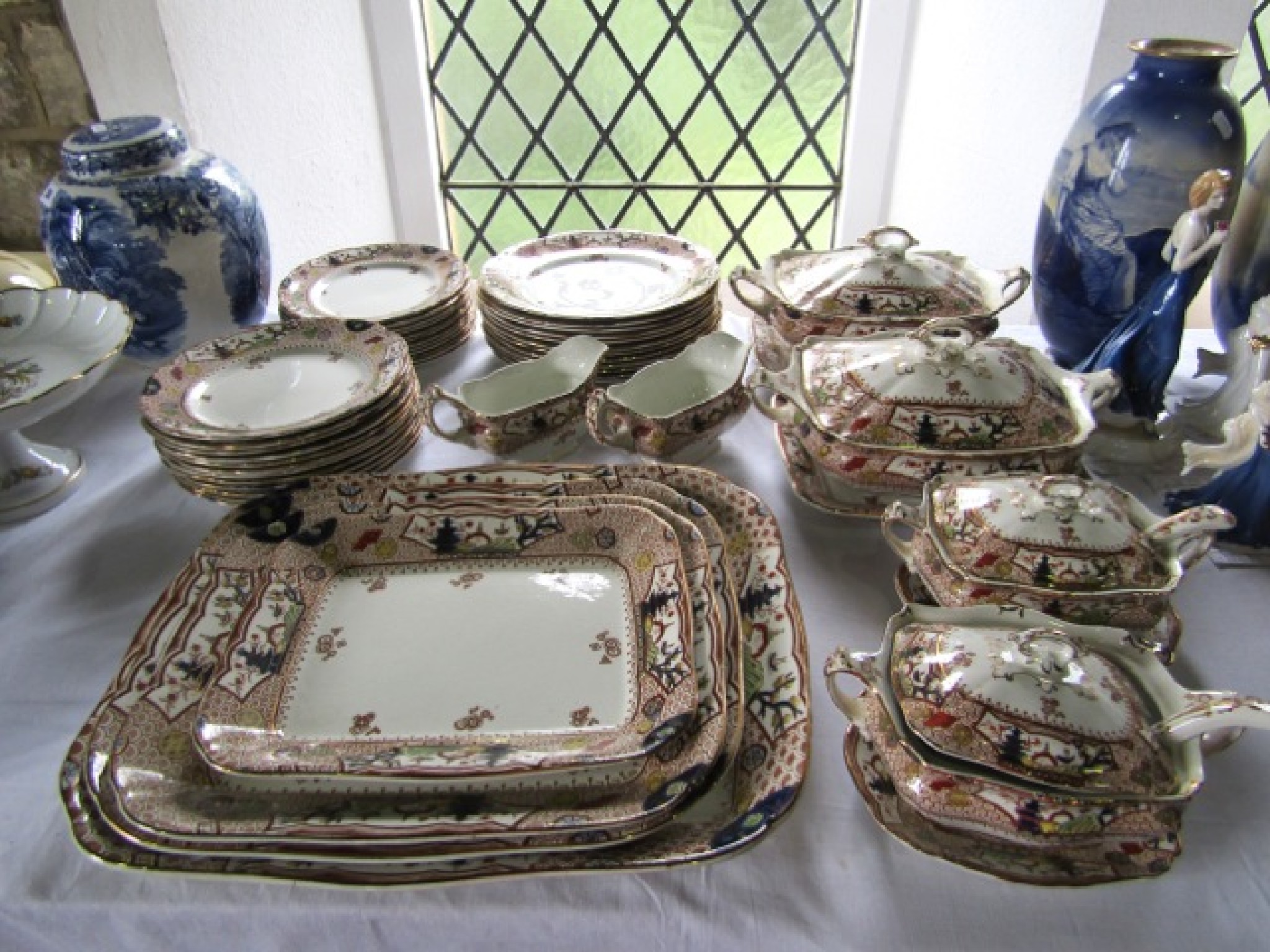 Appraisal: A quantity of late Victorian Cypress pattern dinnerwares with printed