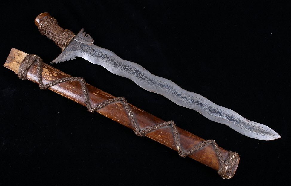 Appraisal: Filipino Moro Traditional Kris Sword With Sheath Offered in this