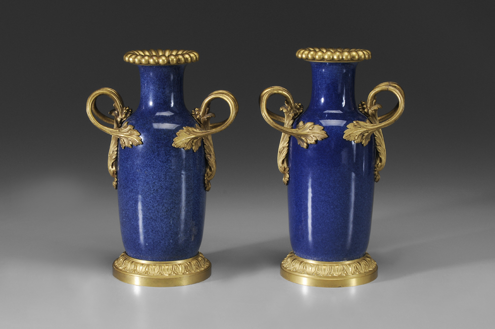 Appraisal: Pair Bronze-Mounted Porcelain Vases Chinese baluster form with powder blue